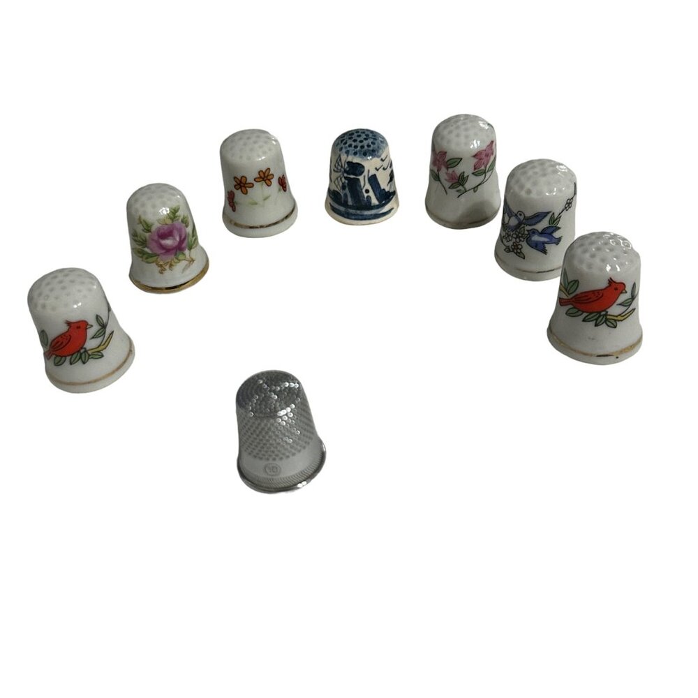 Lot of 8 collectible thimbles 7 porcelain/ceramic 1 metal cardinals delft floral